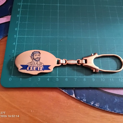 Metal souvenir keychain of Crete in copper tone