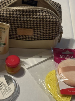 Toiletry bag with cosmetics like new, fabric and leatherette