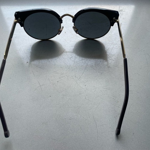 Sunglasses cat eye style like new, black and gold
