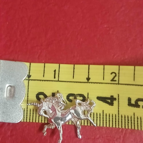 Silver unicorn pendant