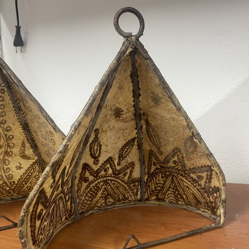 Leather wall sconces like new with Moroccan designs for exotic atmosphere
