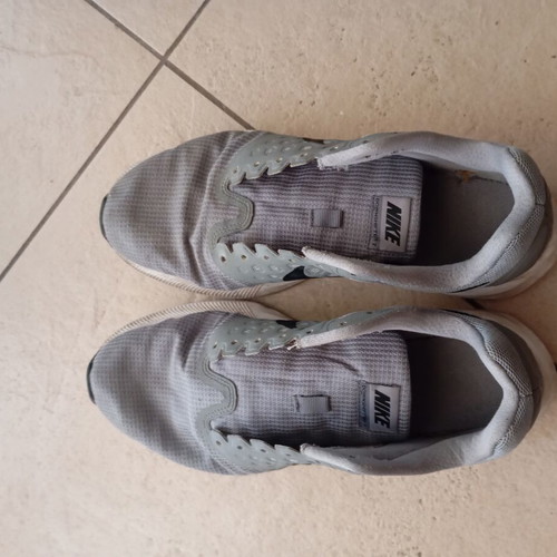 Nike men's athletic shoes, grey, size 43, missing laces