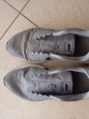 Nike men's athletic shoes, grey, size 43, missing laces