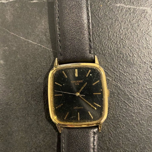 Orient VX used, needs battery, black and gold