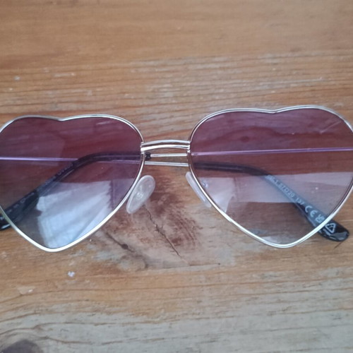 Heart-shaped sunglasses like new