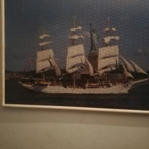 Puzzle 68x48 with wooden frame like new