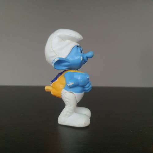 Greedy Smurf figure used with functional mechanism