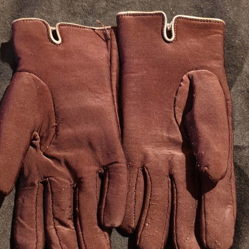 Women's brown gloves used with fleece lining and decorative tassels