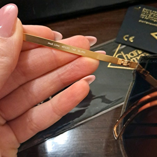 Charlie Max women's sunglasses gold with pink lenses like new
