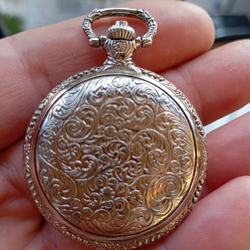 Dhalya pocket watch like new with intricate designs and new battery