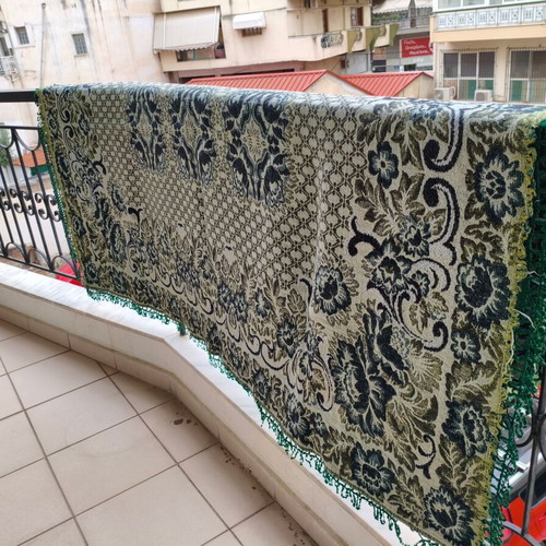 Woven green blanket used 178x125 without fringes