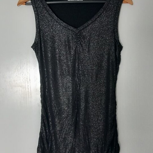 Sleeveless top, shiny elastic fabric. Size M/L