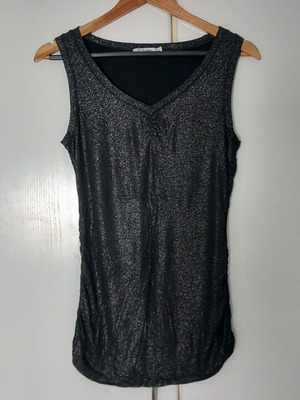 Sleeveless top, shiny elastic fabric. Size M/L
