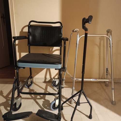 Indoor wheelchair with tripod cane and night container holder like new