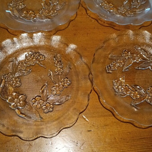 Set of 4 glass dessert plates like new with embossed flower design