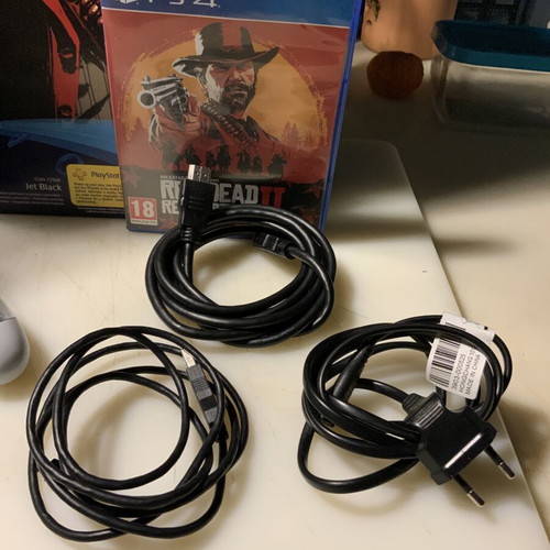 PlayStation PRO 1TB console with XRay controller, cables and Red Dead Redemption 2 game