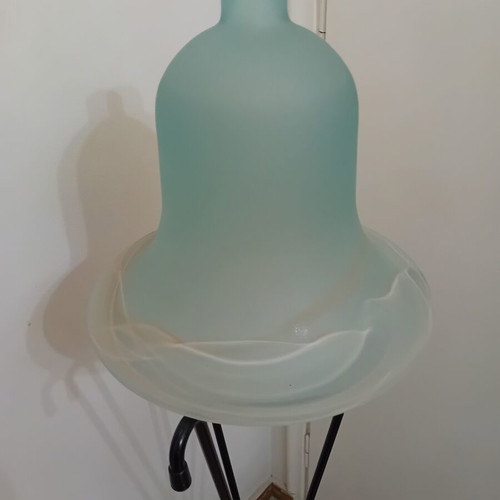 Handmade metal floor plant stand with glass blue-green container, used
