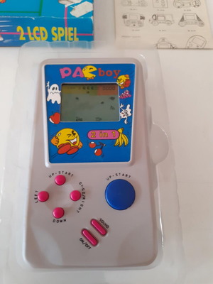 Pac Boy handheld electronic game new