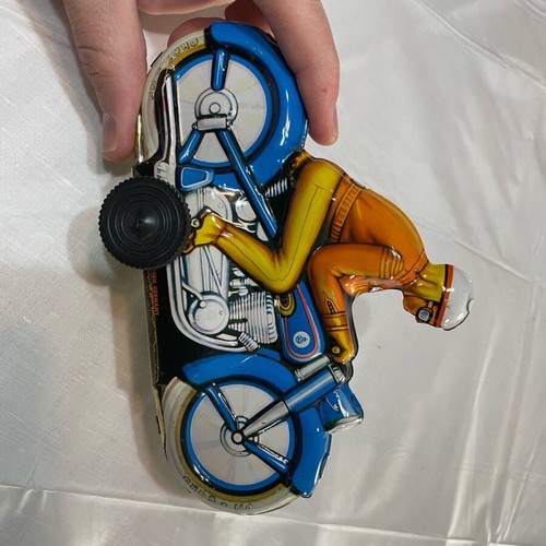 Motorcyclist vintage tin toy made in West Germany like new