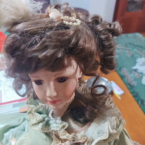 Vintage porcelain doll used