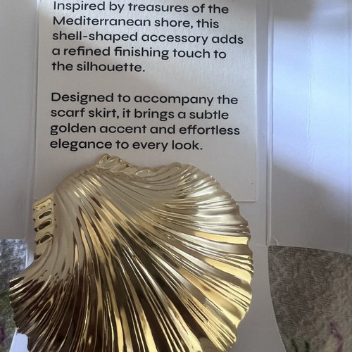 Vassia Kostara gold shell accessory