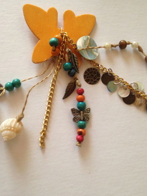 Butterfly brooch used with beads and shells