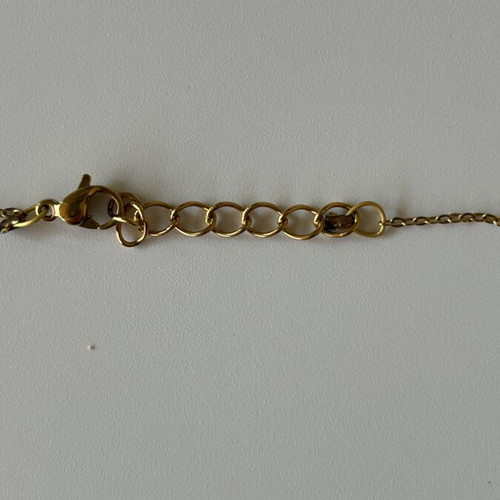 Gold chain with pendant like new, decorated with colorful microcrystals