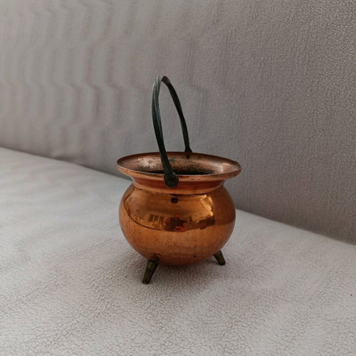Vintage German copper vessel used with twisted handle and brass legs