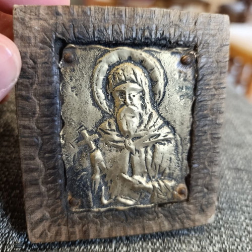 Saint Anthony brass icon on wood