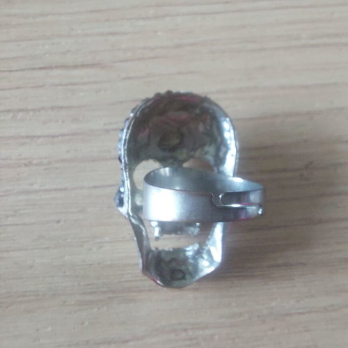 Skull ring like new with black and clear crystals, adjustable