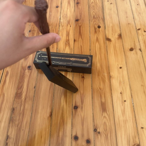 Harry Potter collectible wand like new with stand