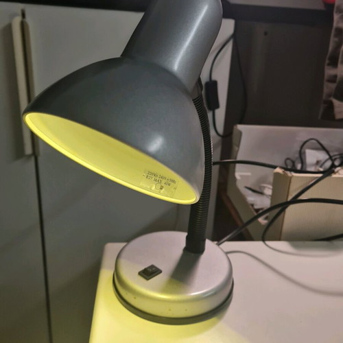 Desk lamp used with flexible arm and switch silver color