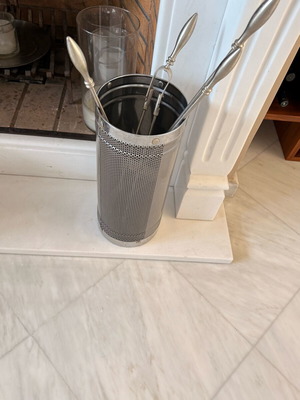 Inox fireplace tool set used with perforated stand