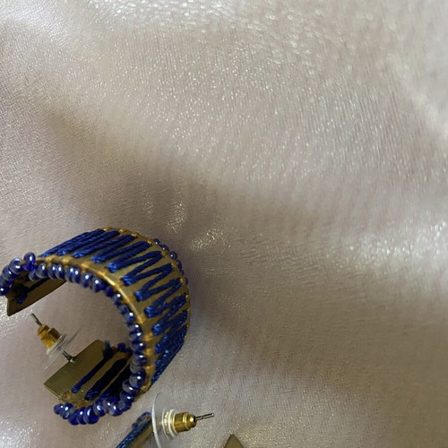 Earrings with blue and brown beads