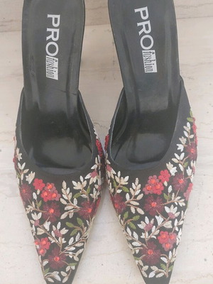 Mule shoes used, satin with floral embroidery, size 36