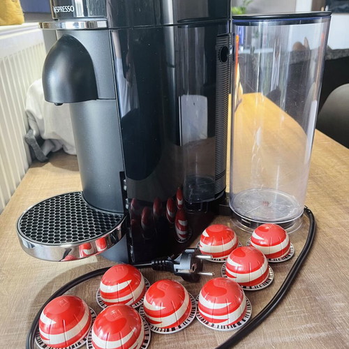 Nespresso Vertuo Plus Deluxe Black coffee machine with 8 capsules