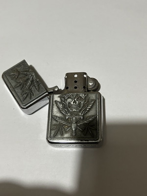 Star metal petrol lighter used with Skull & Cannabis 3D design