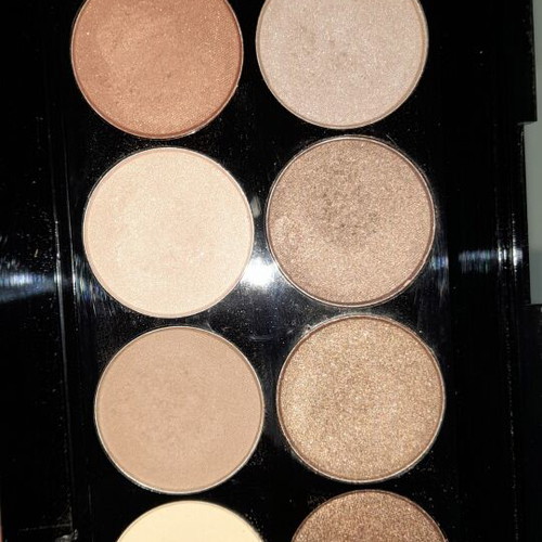 W7 eyeshadow palette with 10 earthy shades and 5 medium makeup brushes, like new