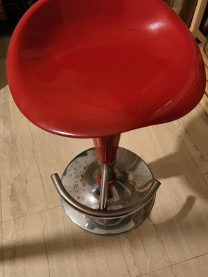Red stool used, does not adjust height