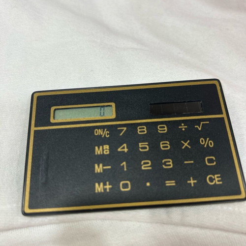 Ultra Thin Calculator with Touchscreen and Solar Power, Like New