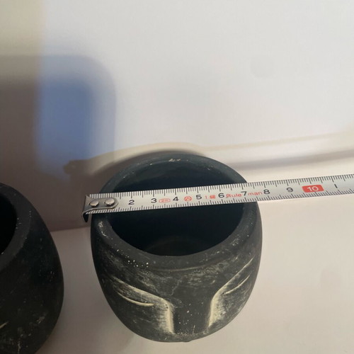Pot Head clay pots set of 2 like new, black with stylized faces