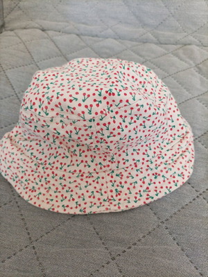 Children's hat like new with cherry pattern