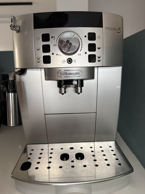 Delonghi Magnifica S espresso coffee machine used with milk frother and grinder