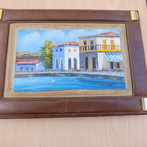 Handmade painting on canvas in leather tabletop frame, used