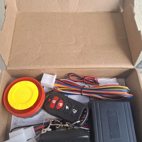 Motorcycle alarm system new with remote start and keyless drive