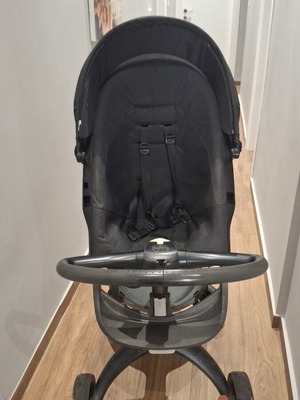 Stokke stroller used, black with waterproof changing bag and sun canopy