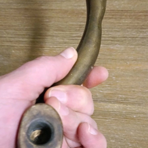 Pair of vintage brass door handles 1950 with natural patina used