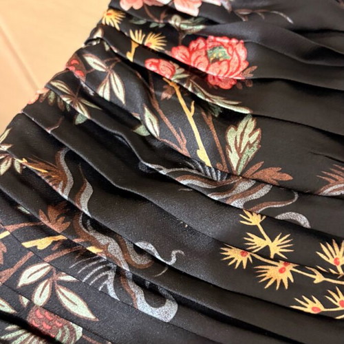 Mango pleated skirt new, black with multicolor patterns, size small