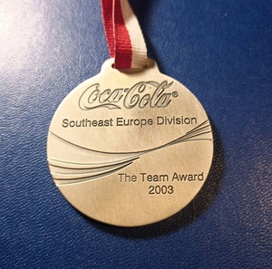 Συλλεκτικό Ασημένιο Μετάλλιο Coca-Cola "The Team Award 2003" – Ασήμι 925
