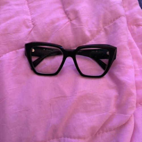 Prada eyeglasses black used with replaceable lenses